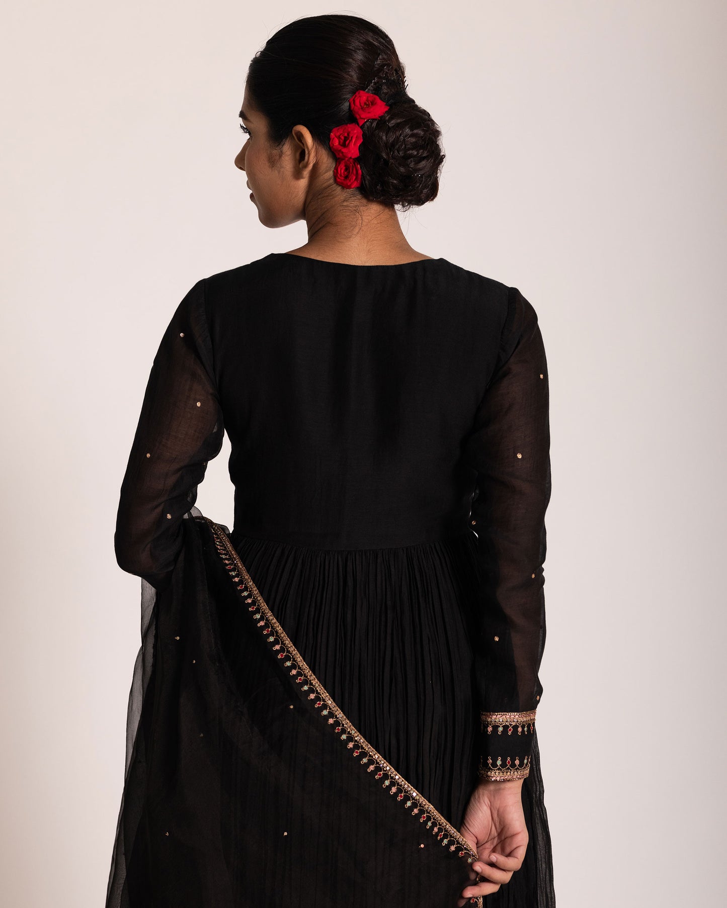 Black Aliya cut salwar set with sleek silhouette and timeless elegance, crafted for a bold, sophisticated, and graceful ethnic statement.