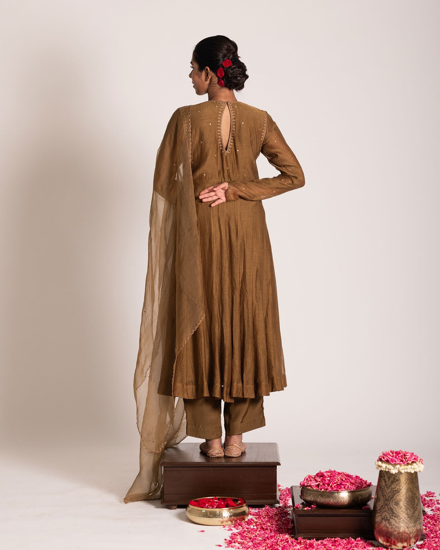 Golden caramel salwar set with rich warm tones and refined elegance, designed for a graceful and sophisticated ethnic statement.