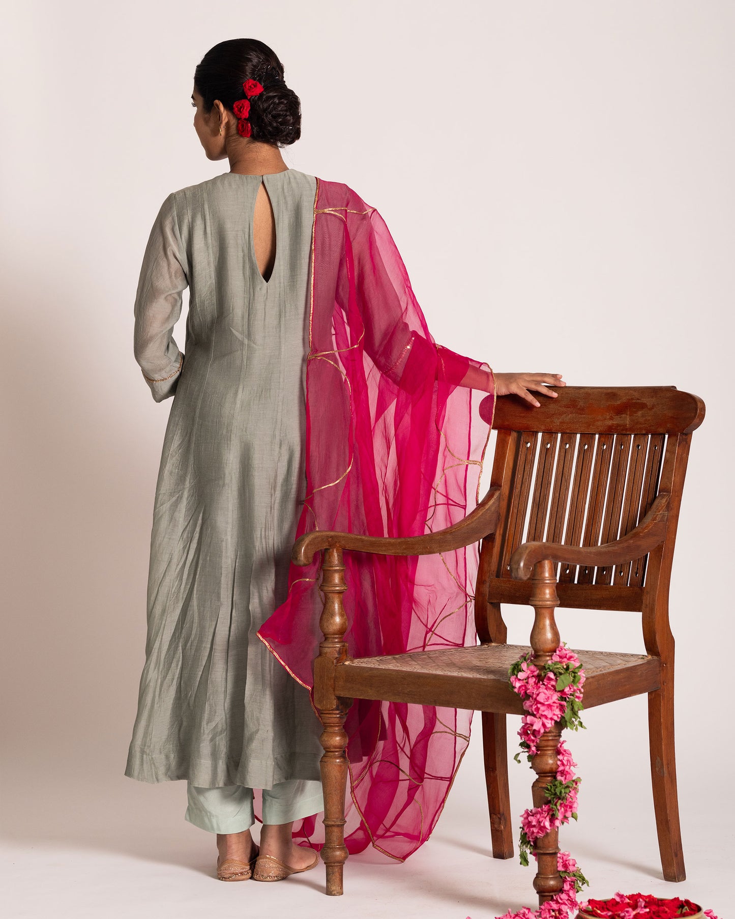 Teal grey and hot pink salwar set with striking color contrast and elegant design, perfect for a bold yet graceful ethnic statement.