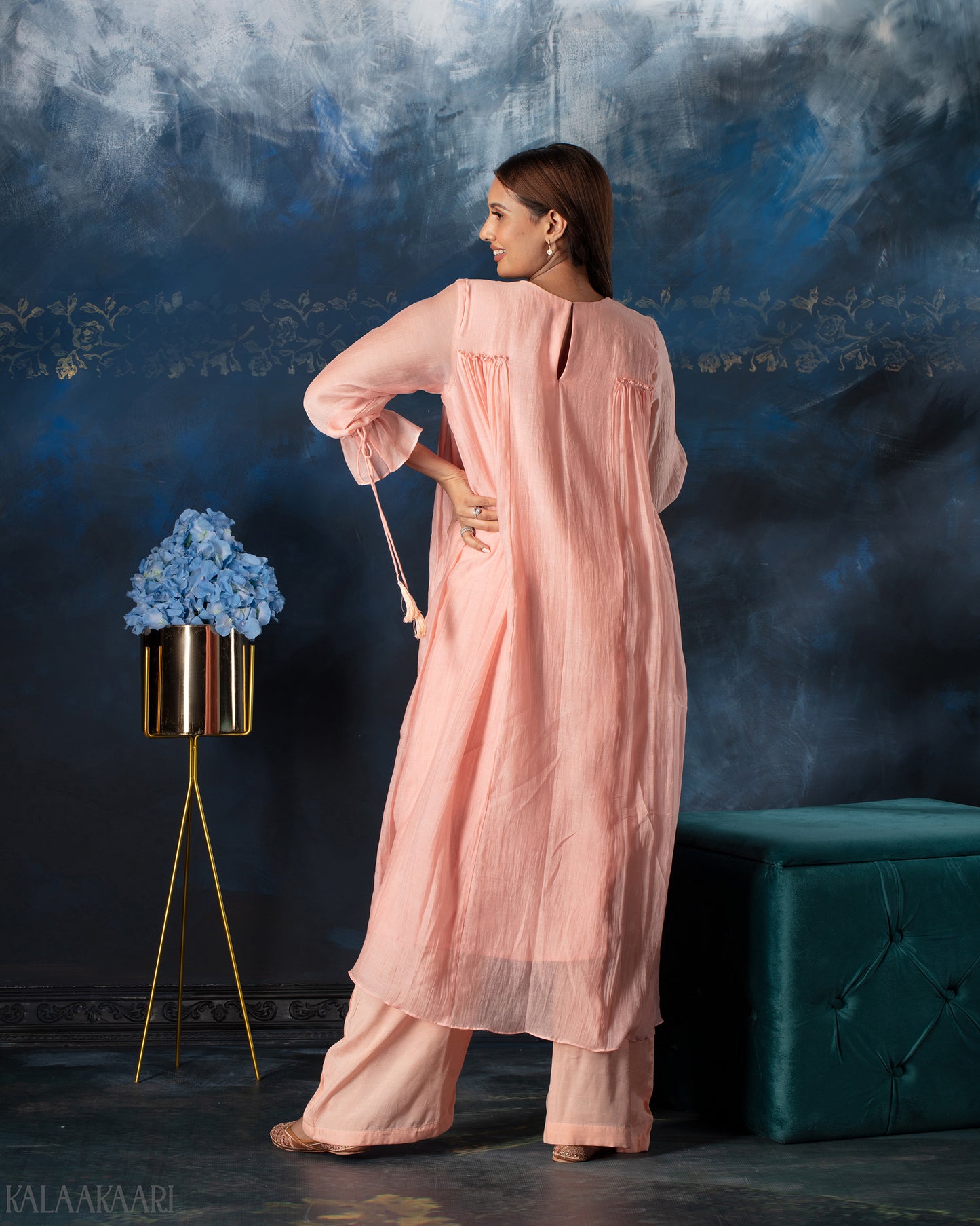 Rose quartz gathered salwar set with soft draping and graceful silhouette, designed for an elegant and effortlessly charming ethnic style.