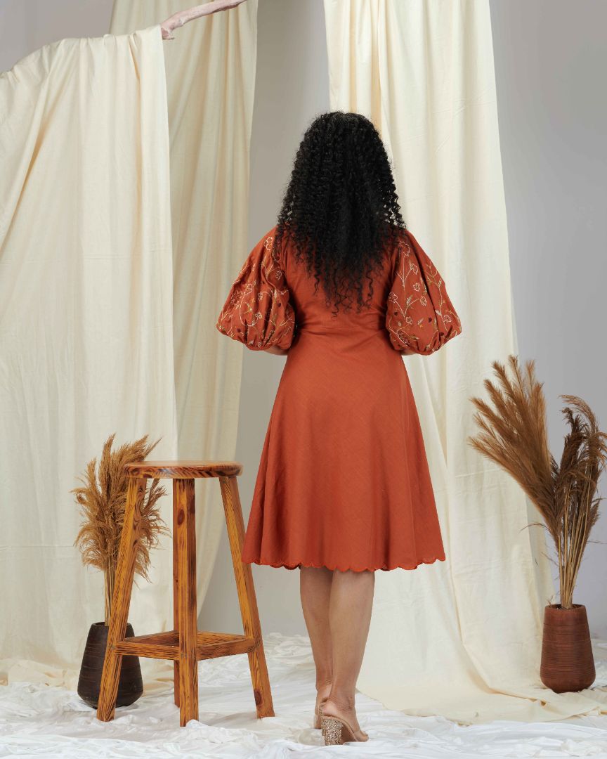 DRESS IN BURNT ORANGE SHADE