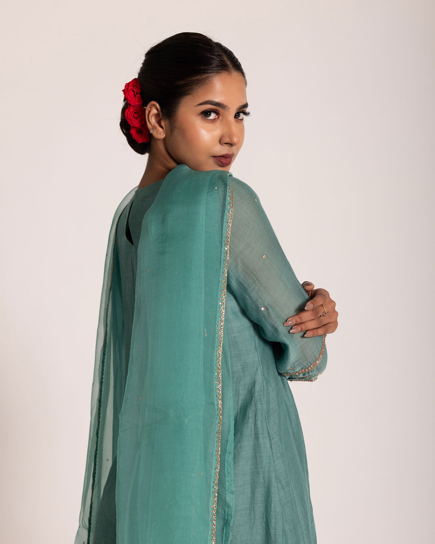 Teal blue gathered salwar set with rich jewel tones and graceful drape, crafted for a sophisticated and effortlessly elegant ethnic look.