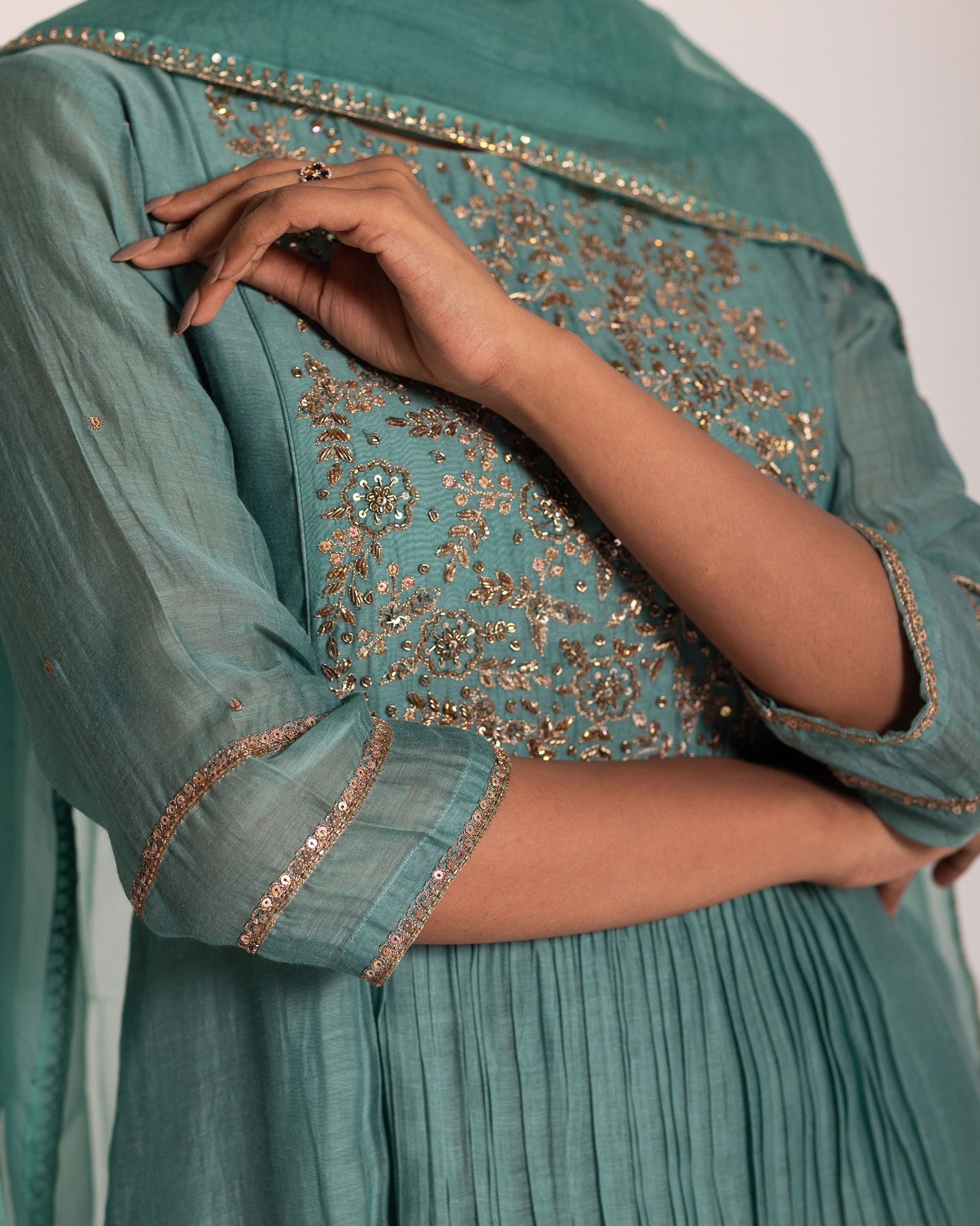 Teal blue gathered salwar set with rich jewel tones and graceful drape, crafted for a sophisticated and effortlessly elegant ethnic look.