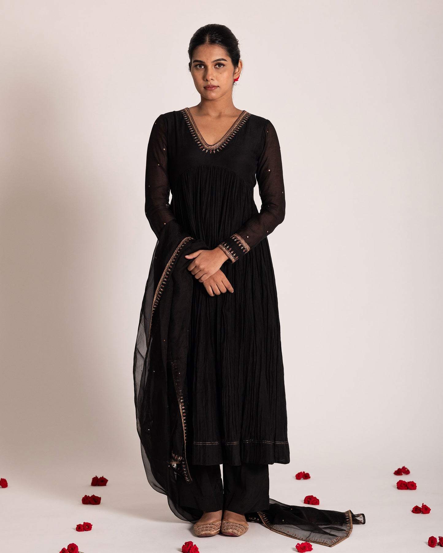 Black Aliya cut salwar set with sleek silhouette and timeless elegance, crafted for a bold, sophisticated, and graceful ethnic statement.