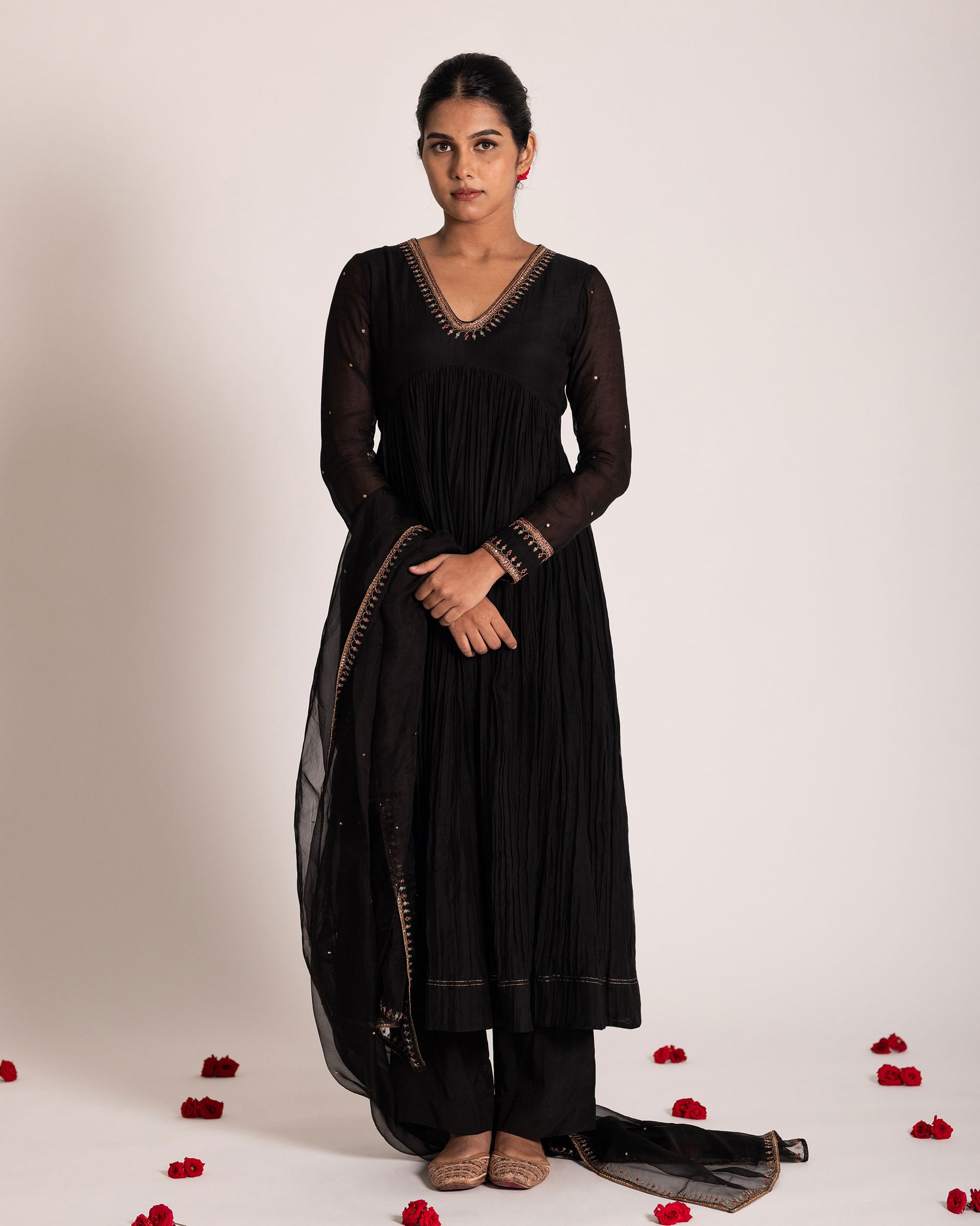 Black Aliya cut salwar set with sleek silhouette and timeless elegance, crafted for a bold, sophisticated, and graceful ethnic statement.