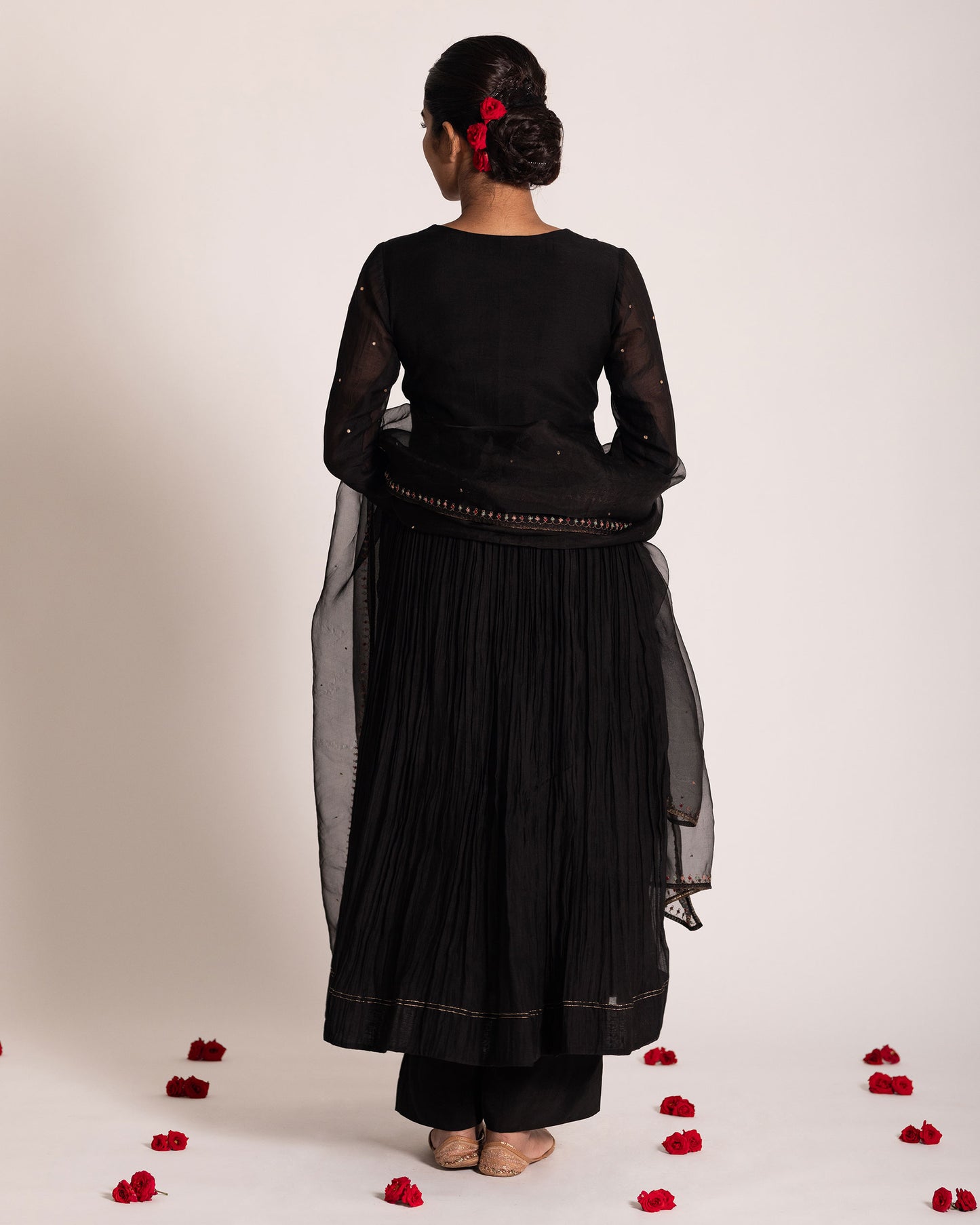 Black Aliya cut salwar set with sleek silhouette and timeless elegance, crafted for a bold, sophisticated, and graceful ethnic statement.