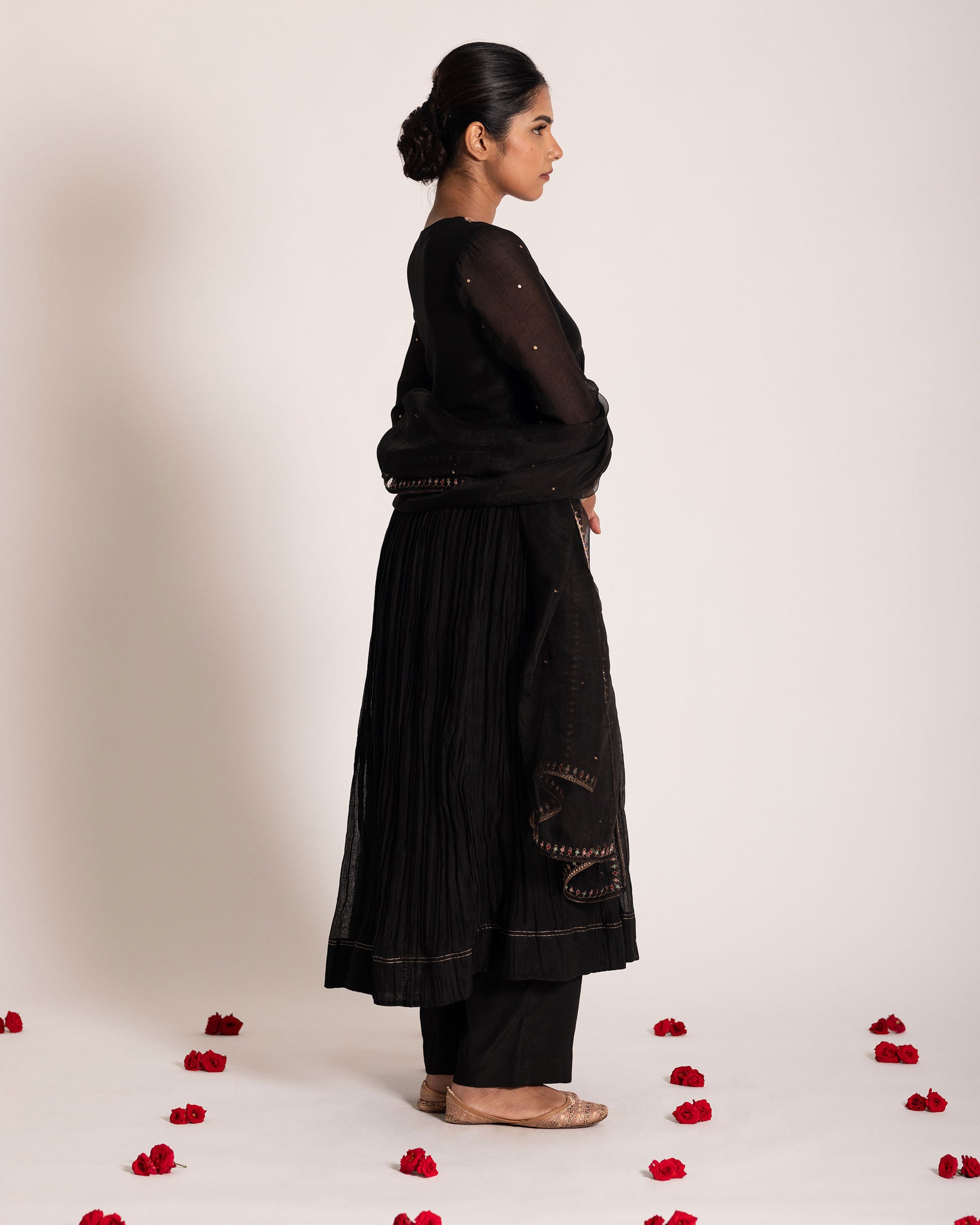 Black Aliya cut salwar set with sleek silhouette and timeless elegance, crafted for a bold, sophisticated, and graceful ethnic statement.