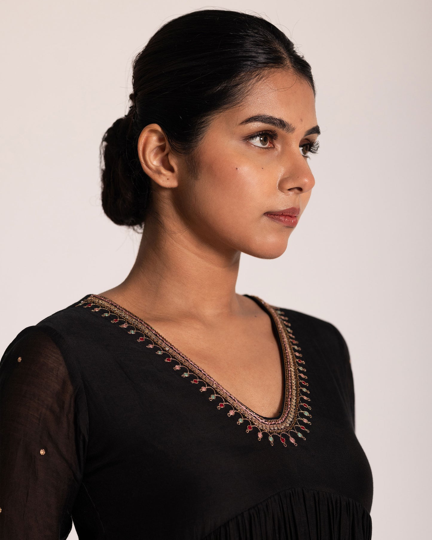 Black Aliya cut salwar set with sleek silhouette and timeless elegance, crafted for a bold, sophisticated, and graceful ethnic statement.