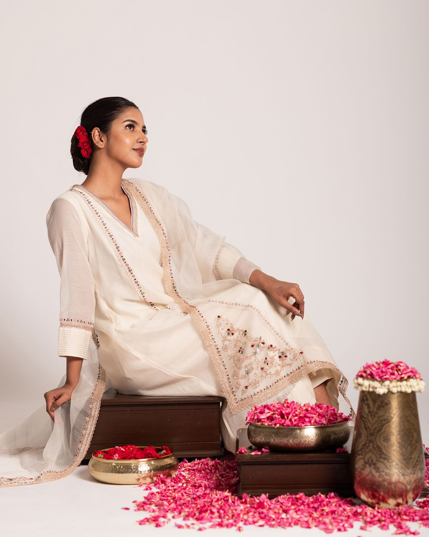 Pearl white salwar set with pristine elegance and timeless charm, crafted for a graceful and sophisticated ethnic look.