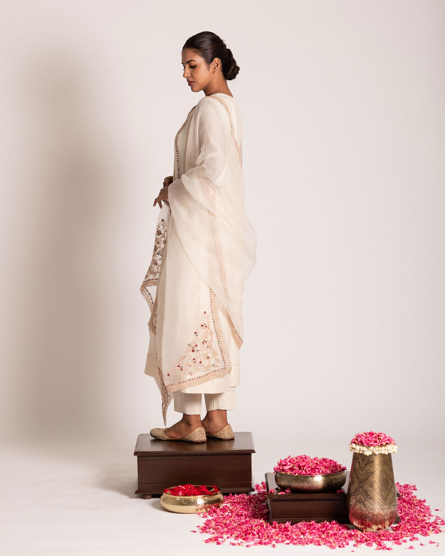 Pearl white salwar set with pristine elegance and timeless charm, crafted for a graceful and sophisticated ethnic look.
