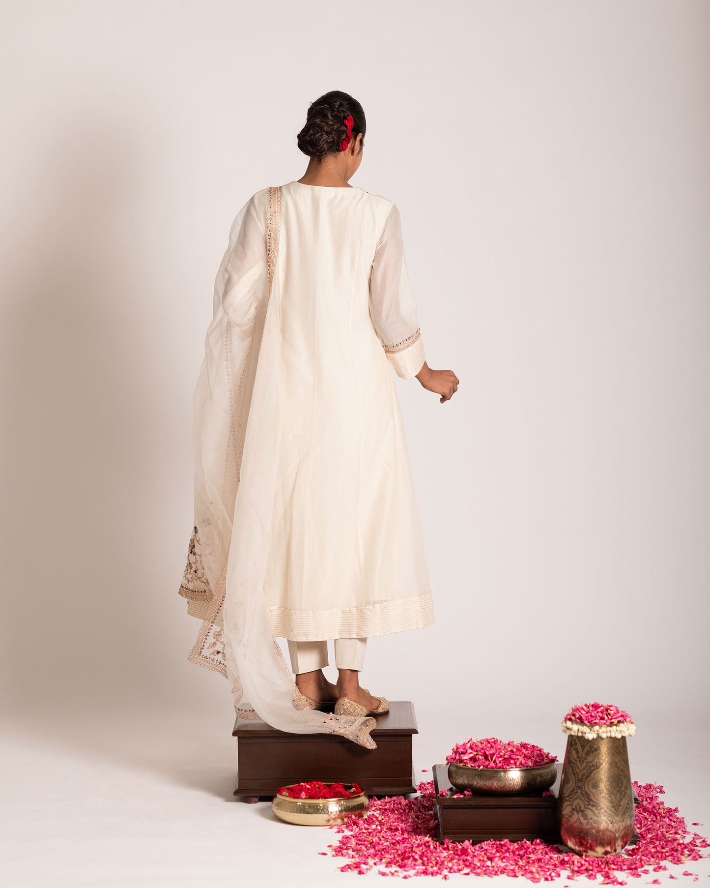 Pearl white salwar set with pristine elegance and timeless charm, crafted for a graceful and sophisticated ethnic look.
