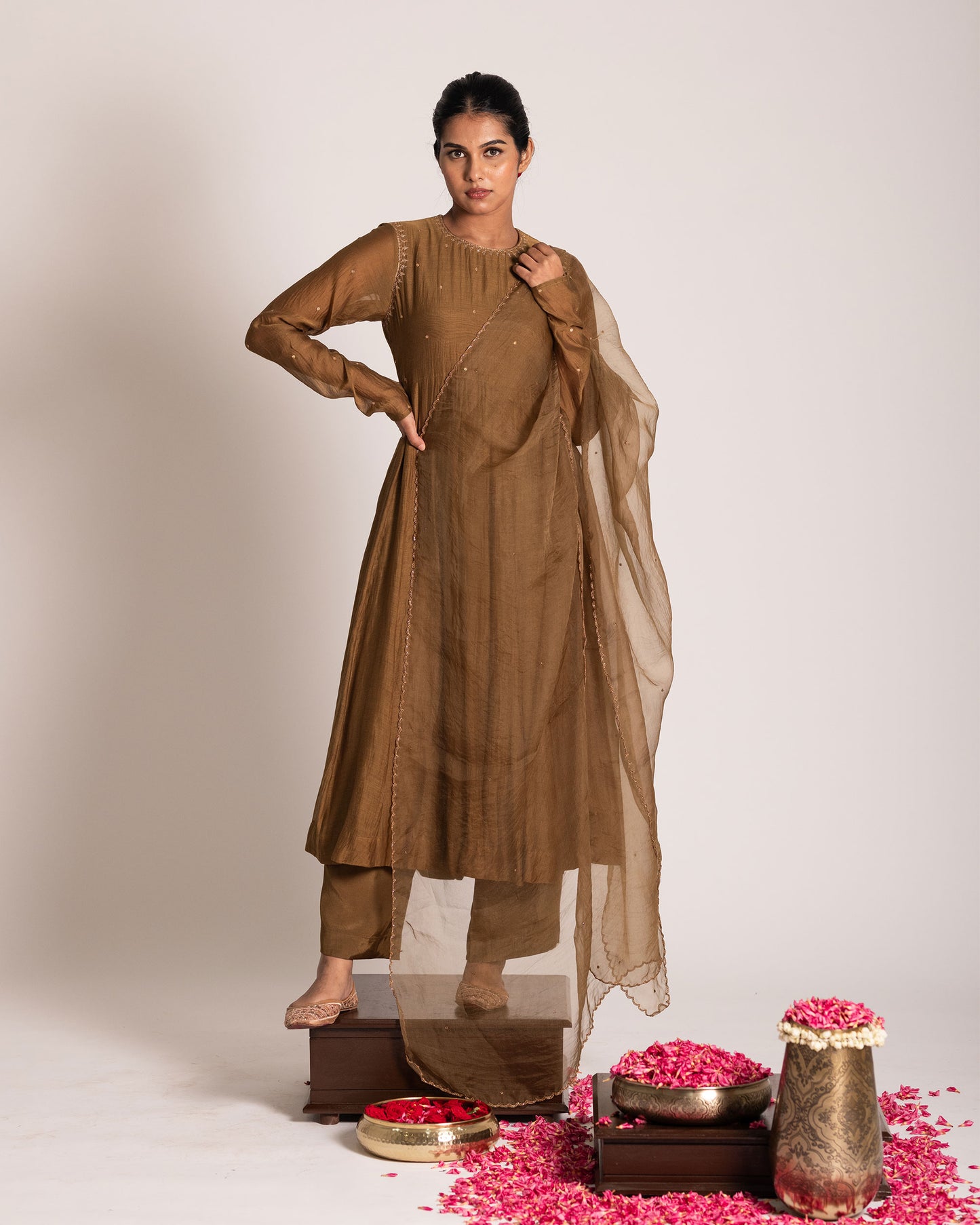 Golden caramel salwar set with rich warm tones and refined elegance, designed for a graceful and sophisticated ethnic statement.