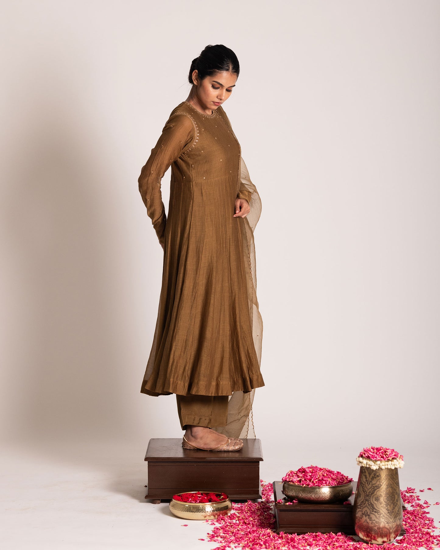 Golden caramel salwar set with rich warm tones and refined elegance, designed for a graceful and sophisticated ethnic statement.
