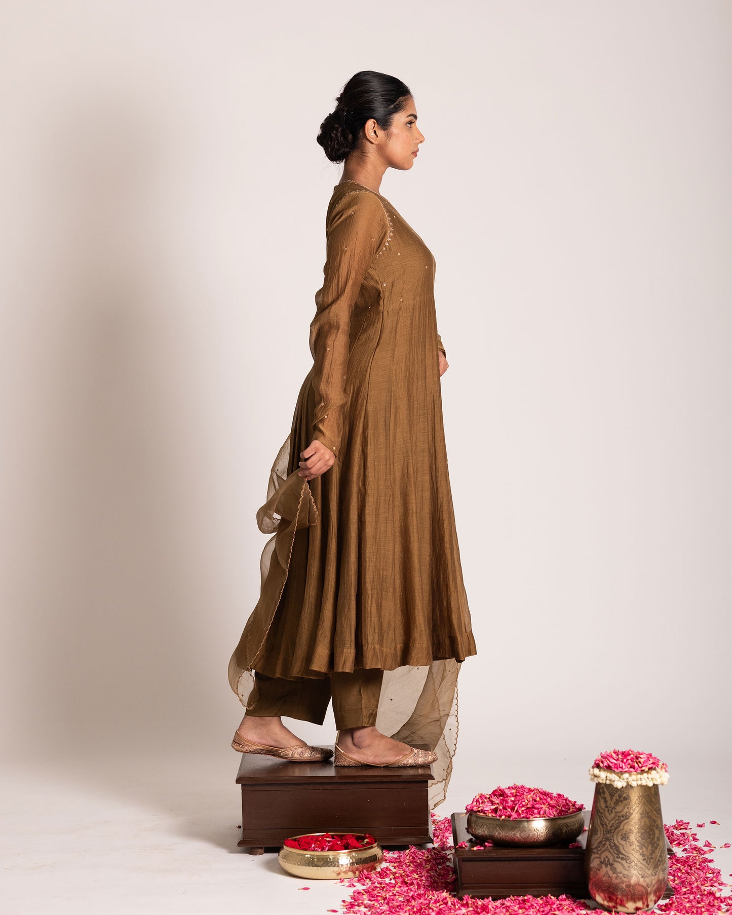 Golden caramel salwar set with rich warm tones and refined elegance, designed for a graceful and sophisticated ethnic statement.