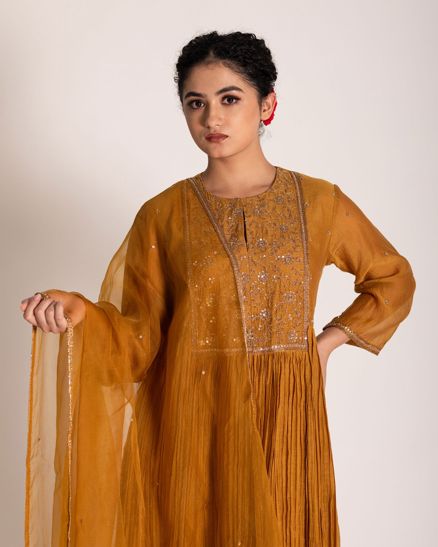 Burnt yellow salwar set with warm earthy tones and elegant styling, crafted for a radiant and timeless ethnic look.