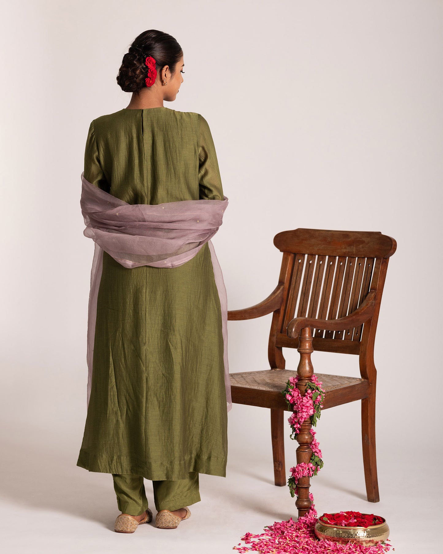 Green and light mauve centre pleated suit with graceful color harmony and refined silhouette, designed for an elegant and contemporary ethnic look.