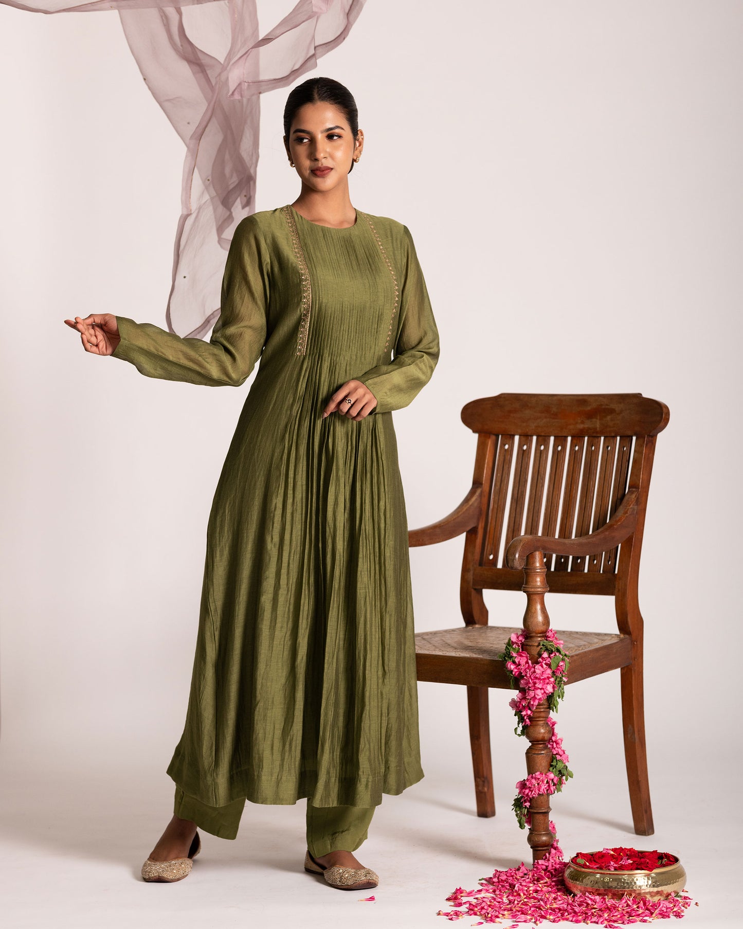 Green and light mauve centre pleated suit with graceful color harmony and refined silhouette, designed for an elegant and contemporary ethnic look.