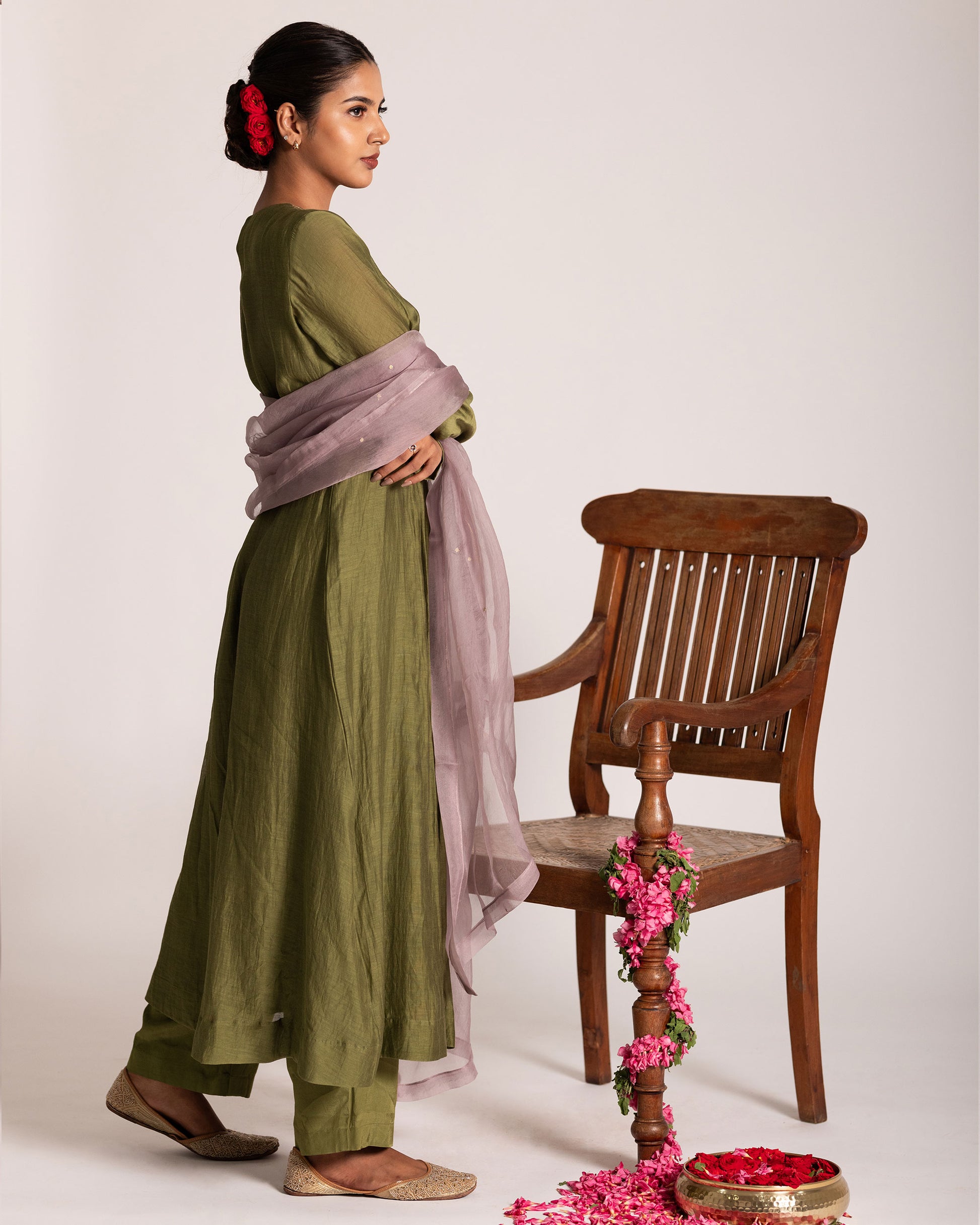 Green and light mauve centre pleated suit with graceful color harmony and refined silhouette, designed for an elegant and contemporary ethnic look.