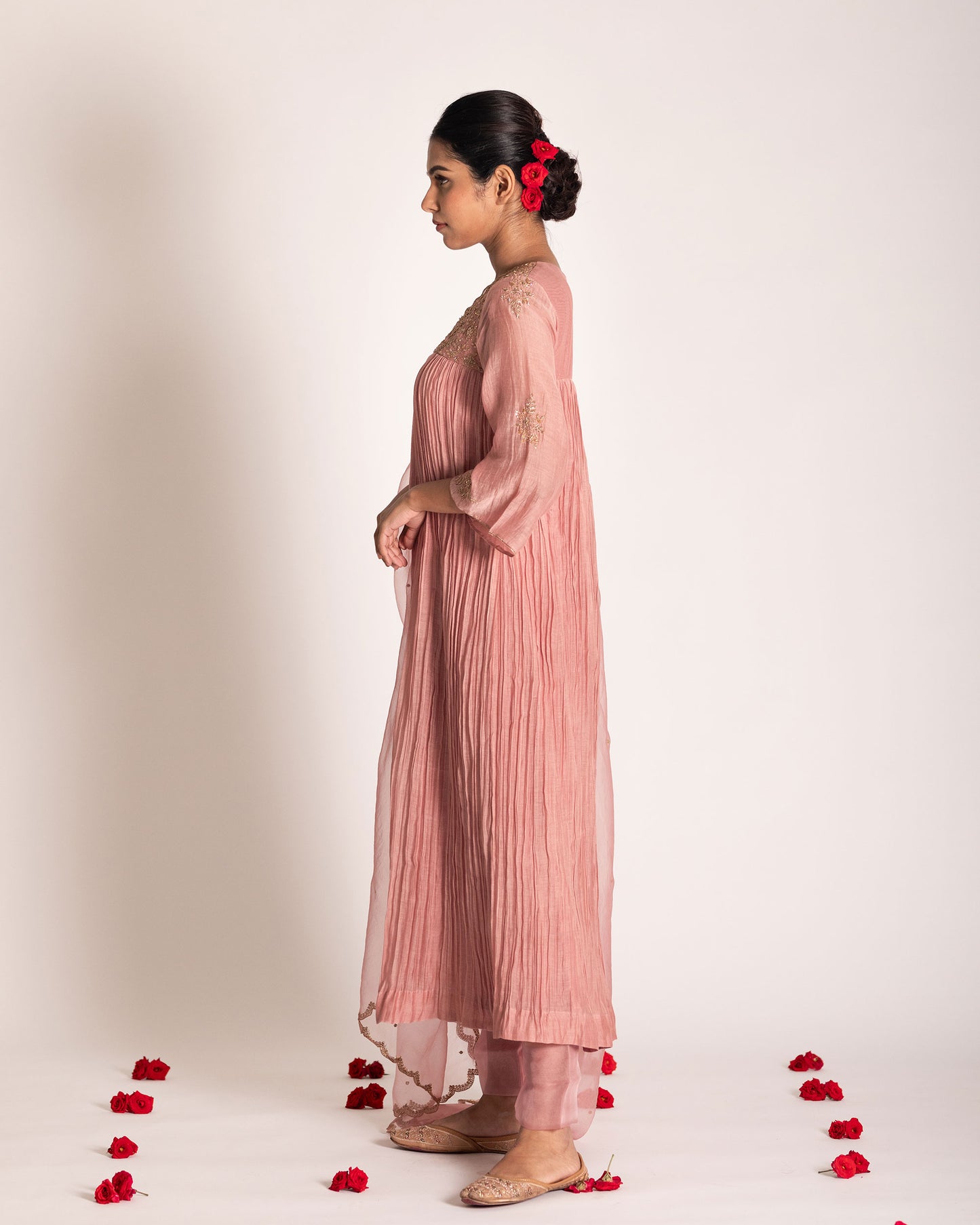 Onion pink salwar set with soft rosy hues and graceful elegance, crafted for a charming and timeless ethnic ensemble.