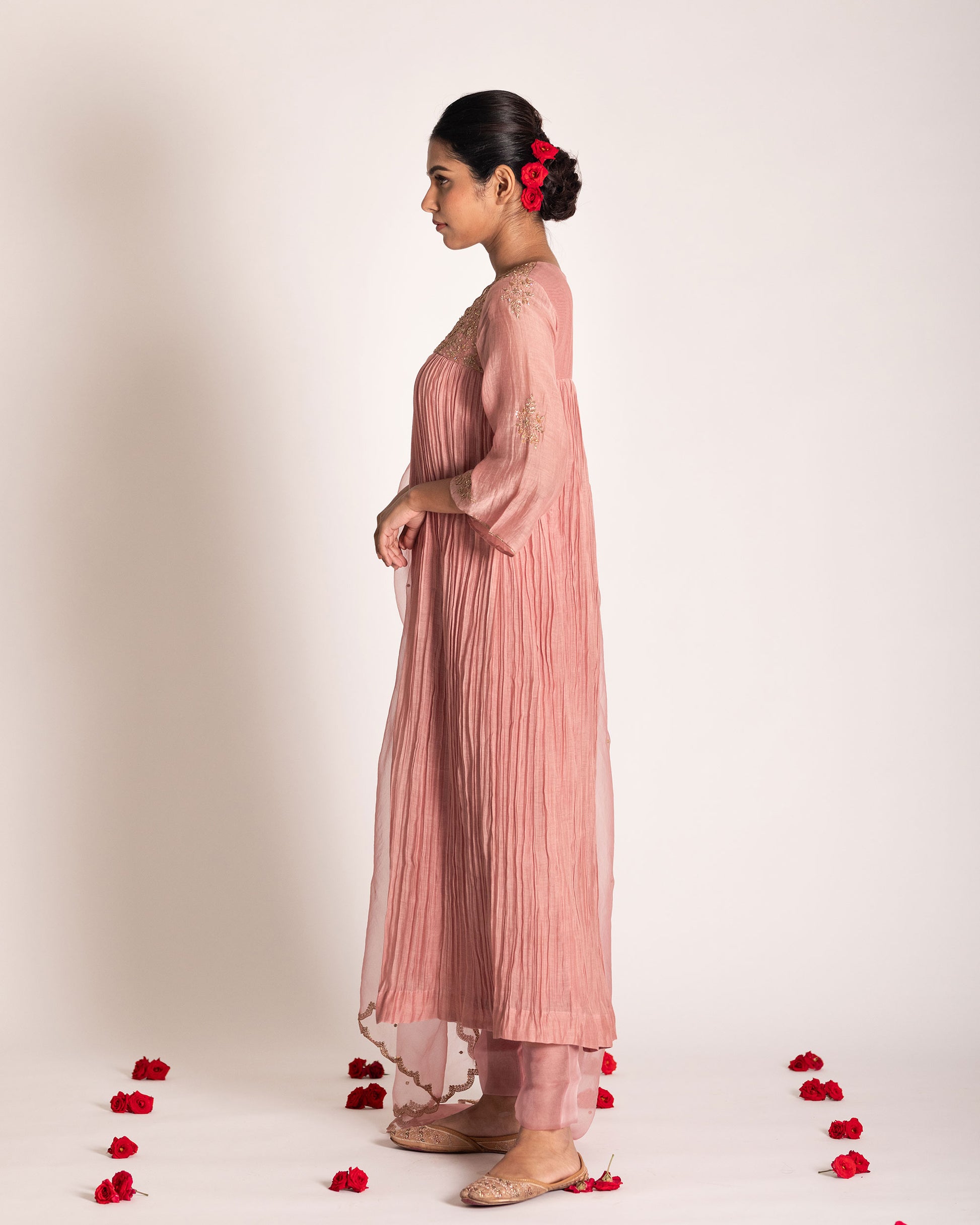 Onion pink salwar set with soft rosy hues and graceful elegance, crafted for a charming and timeless ethnic ensemble.