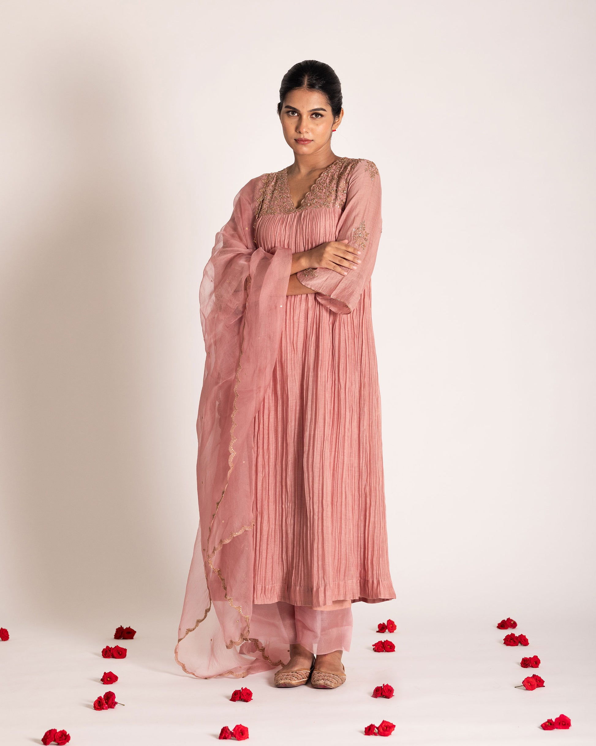 Onion pink salwar set with soft rosy hues and graceful elegance, crafted for a charming and timeless ethnic ensemble.