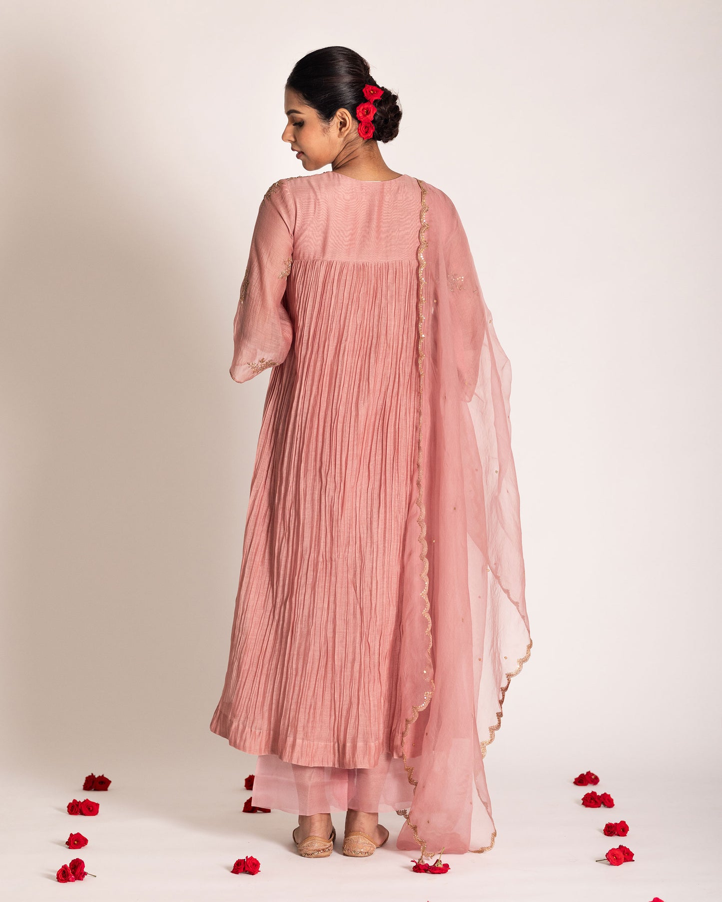Onion pink salwar set with soft rosy hues and graceful elegance, crafted for a charming and timeless ethnic ensemble.