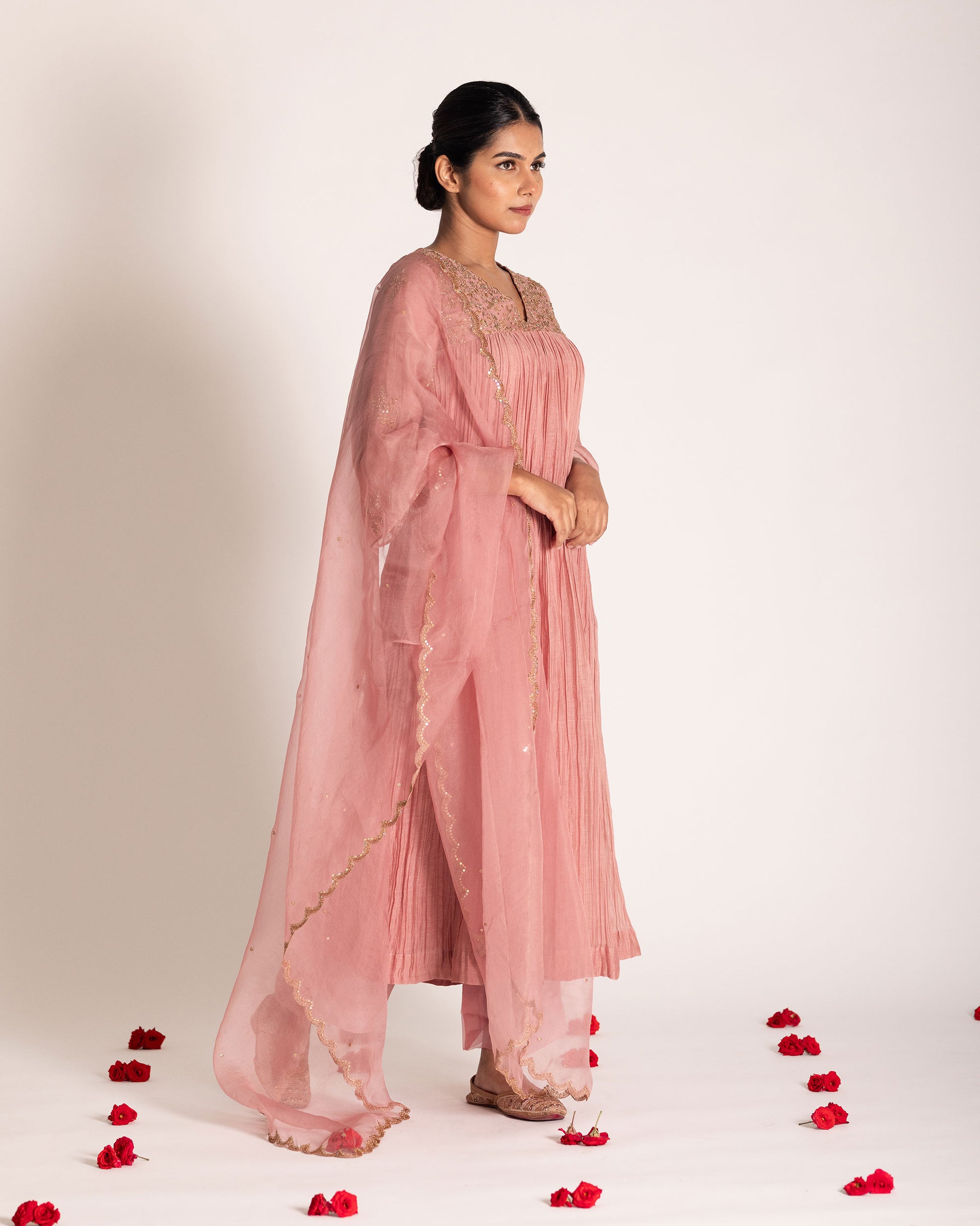 Onion pink salwar set with soft rosy hues and graceful elegance, crafted for a charming and timeless ethnic ensemble.