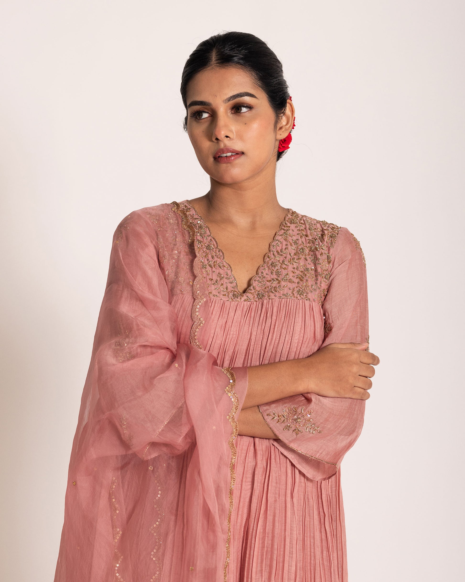 Onion pink salwar set with soft rosy hues and graceful elegance, crafted for a charming and timeless ethnic ensemble.