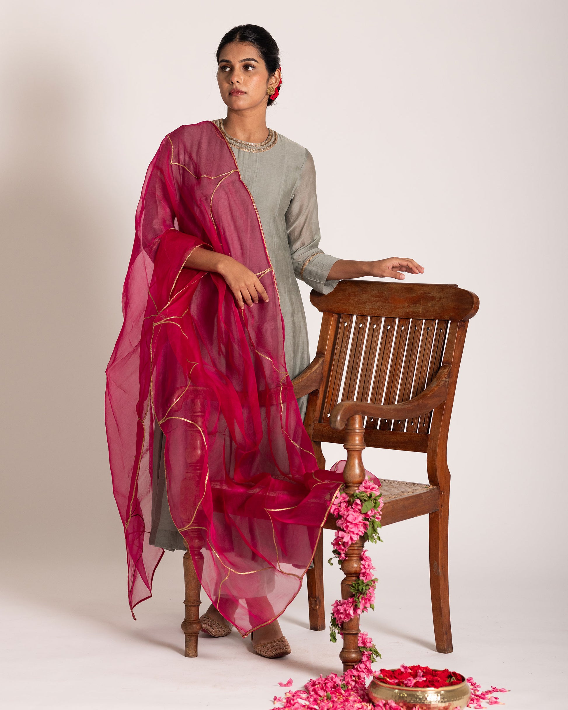 Teal grey and hot pink salwar set with striking color contrast and elegant design, perfect for a bold yet graceful ethnic statement.