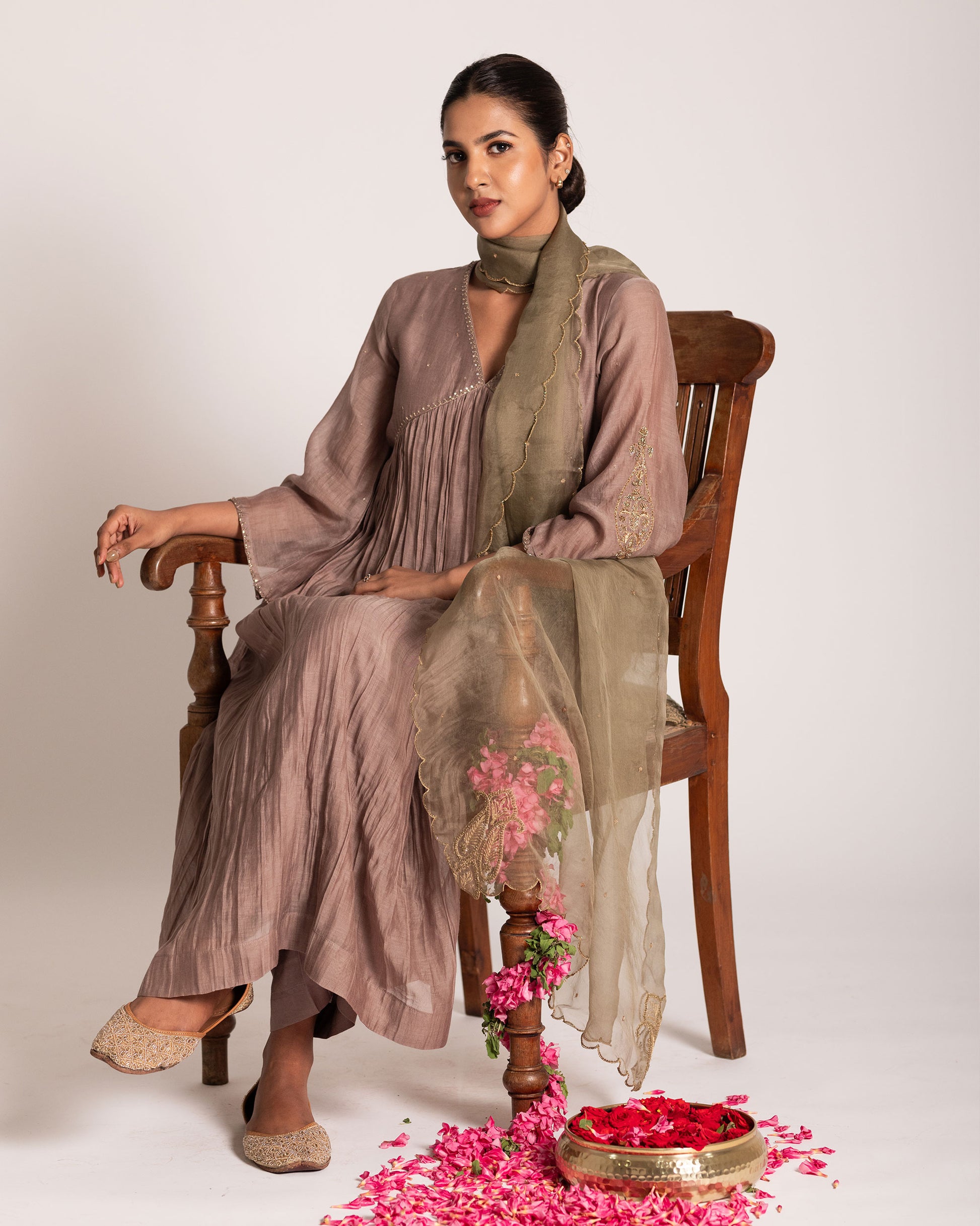 Warm taupe and sage green salwar set with harmonious earthy tones and elegant detailing, crafted for a sophisticated and effortlessly graceful ethnic ensemble.