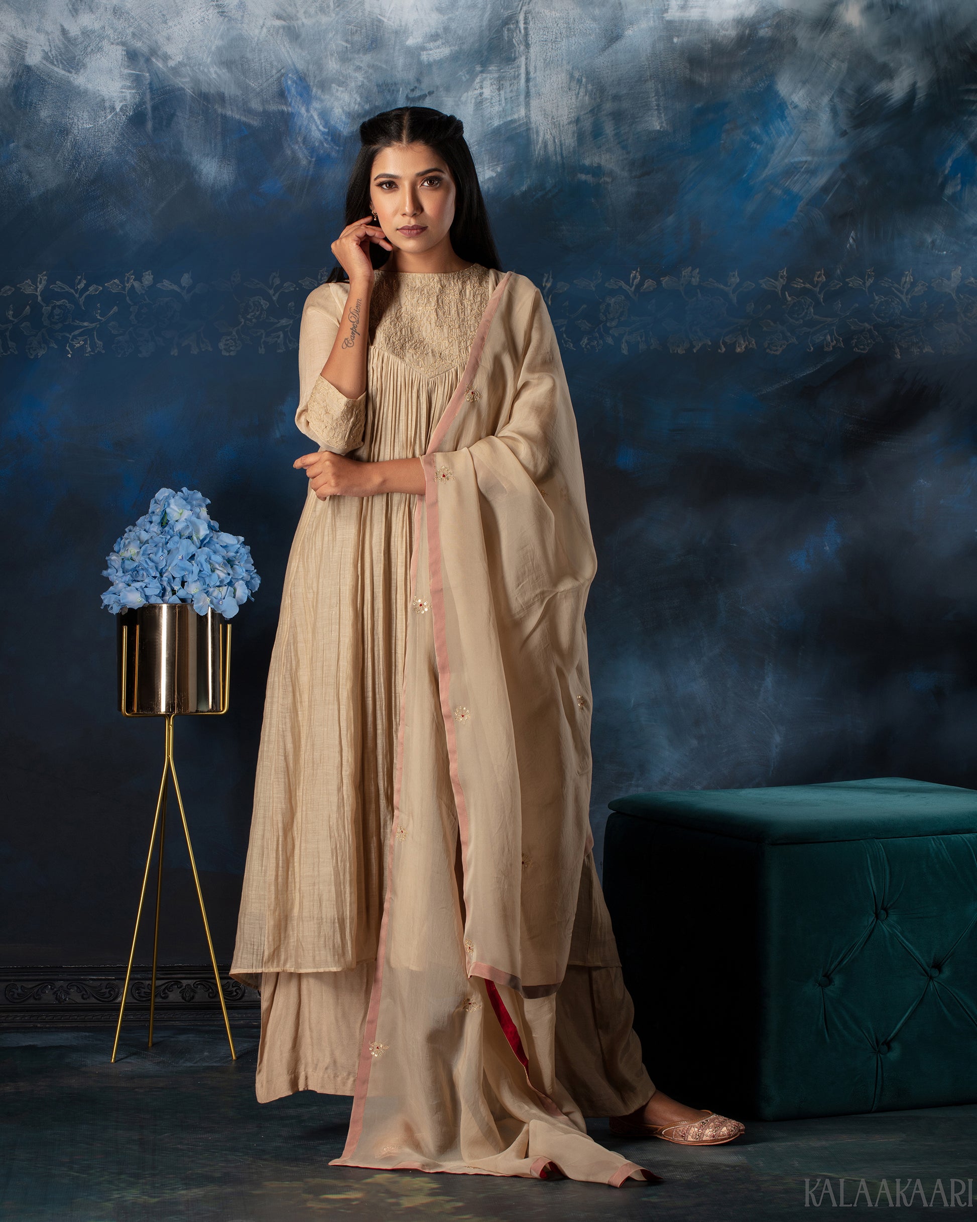 Bleached sand hand embroidered salwar set with subtle elegance and intricate detailing, designed for a timeless and sophisticated ethnic ensemble.