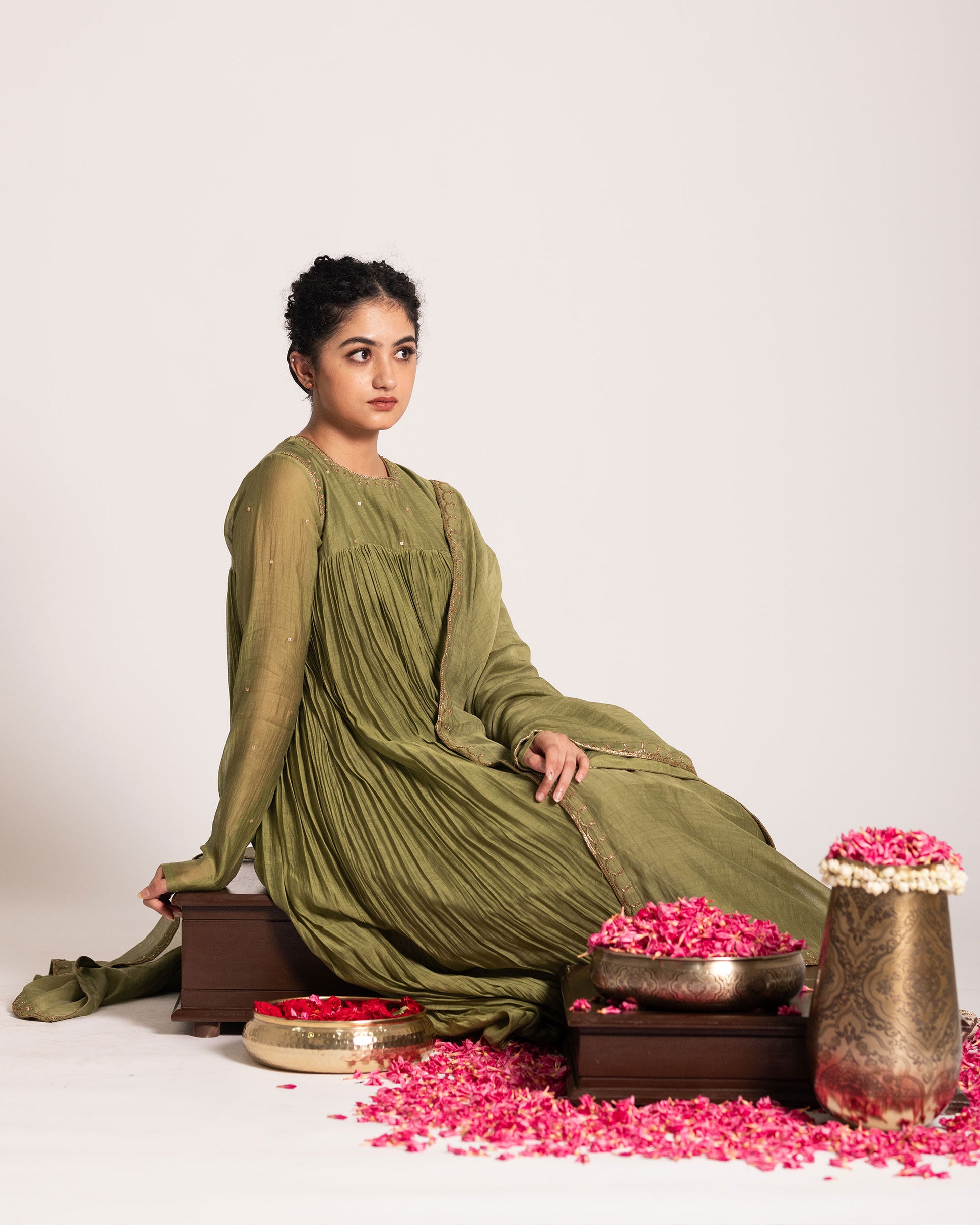 Olive green salwar set with earthy sophistication and elegant styling, crafted for a timeless and effortlessly graceful ethnic look.