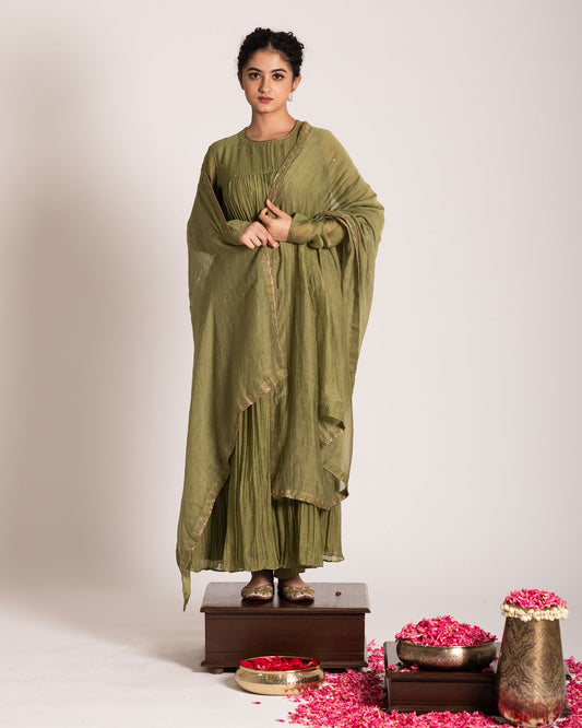 Olive green salwar set with earthy sophistication and elegant styling, crafted for a timeless and effortlessly graceful ethnic look.