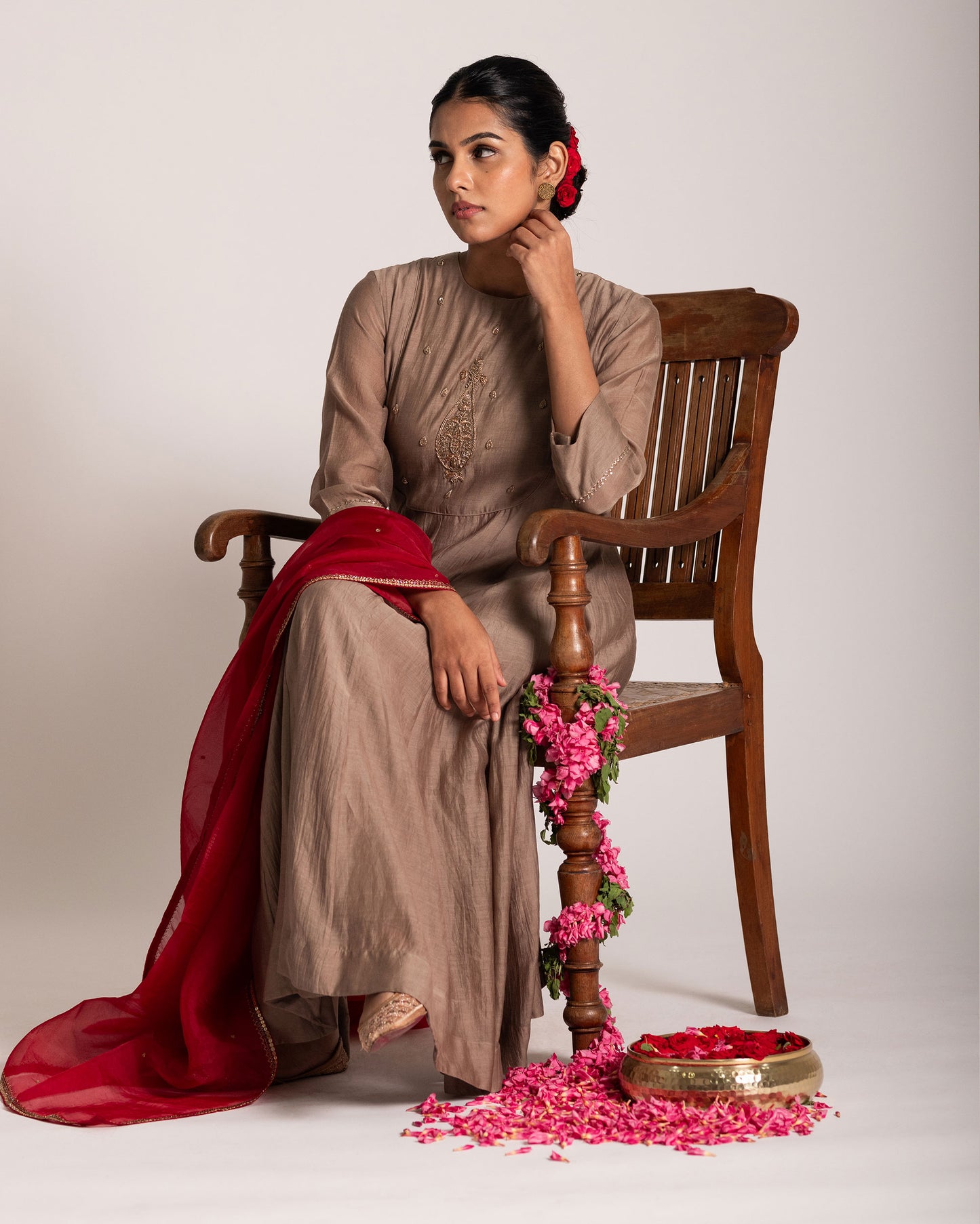 Red and antique bronze Anarkali set with rich festive hues and elegant detailing, crafted for a regal and timeless ethnic statement.