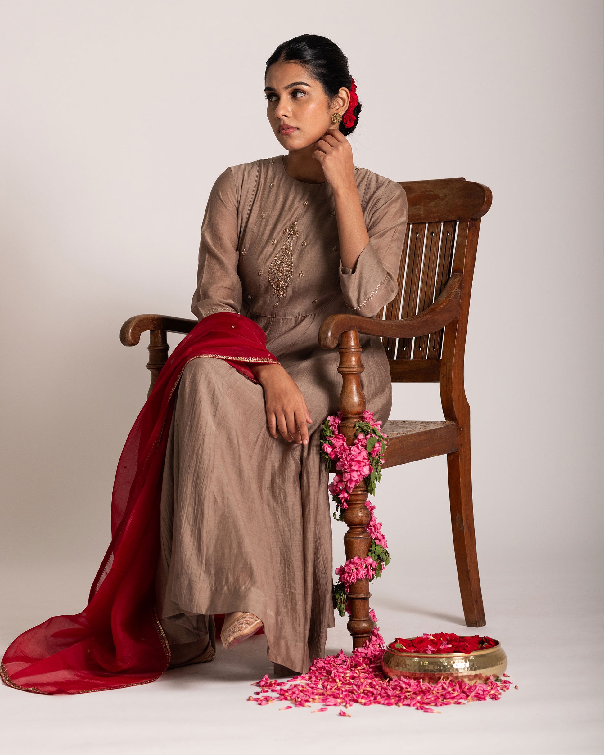 Red and antique bronze Anarkali set with rich festive hues and elegant detailing, crafted for a regal and timeless ethnic statement.