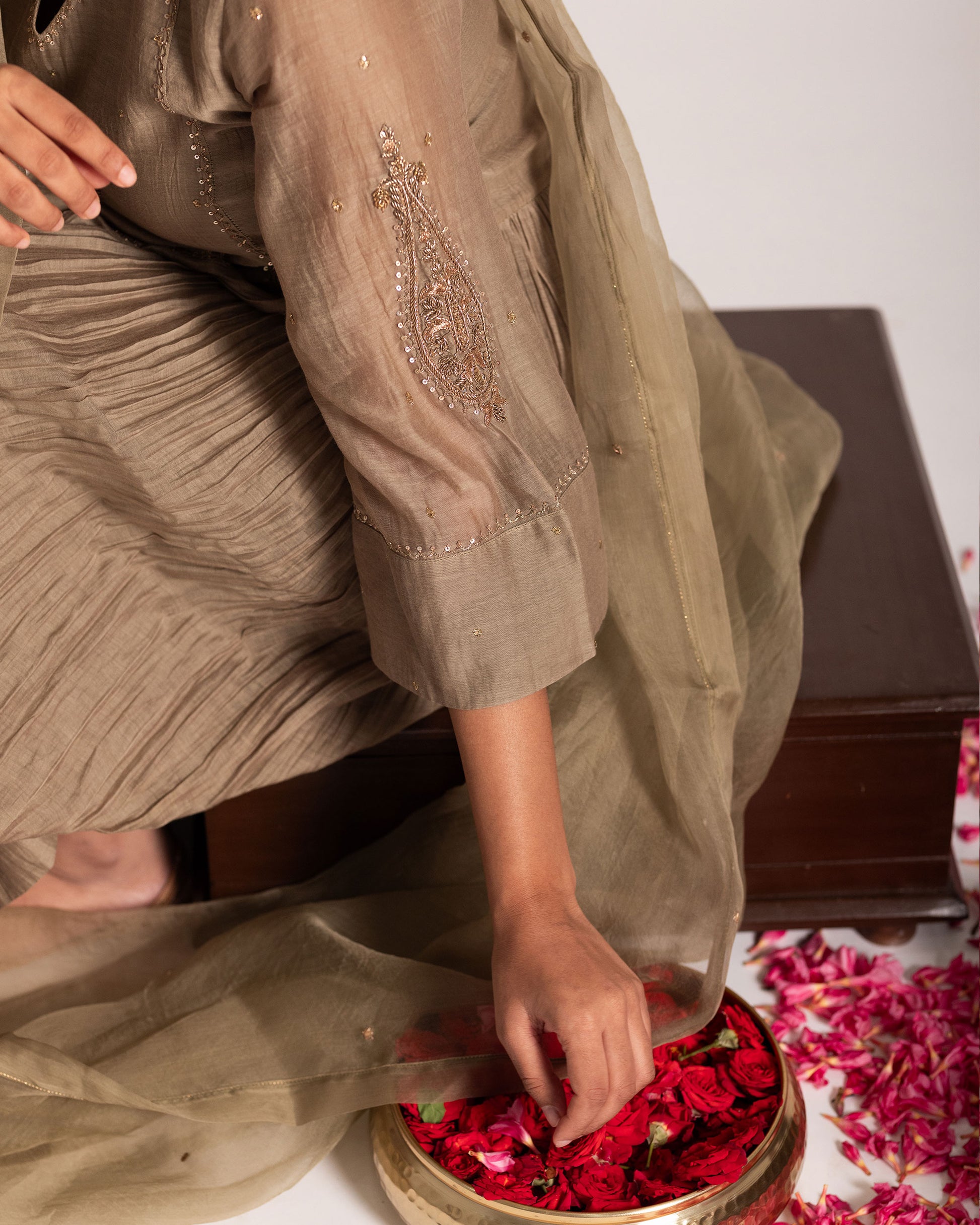 Antique bronze salwar set with rich earthy elegance and timeless detailing, designed for a sophisticated and graceful ethnic ensemble.