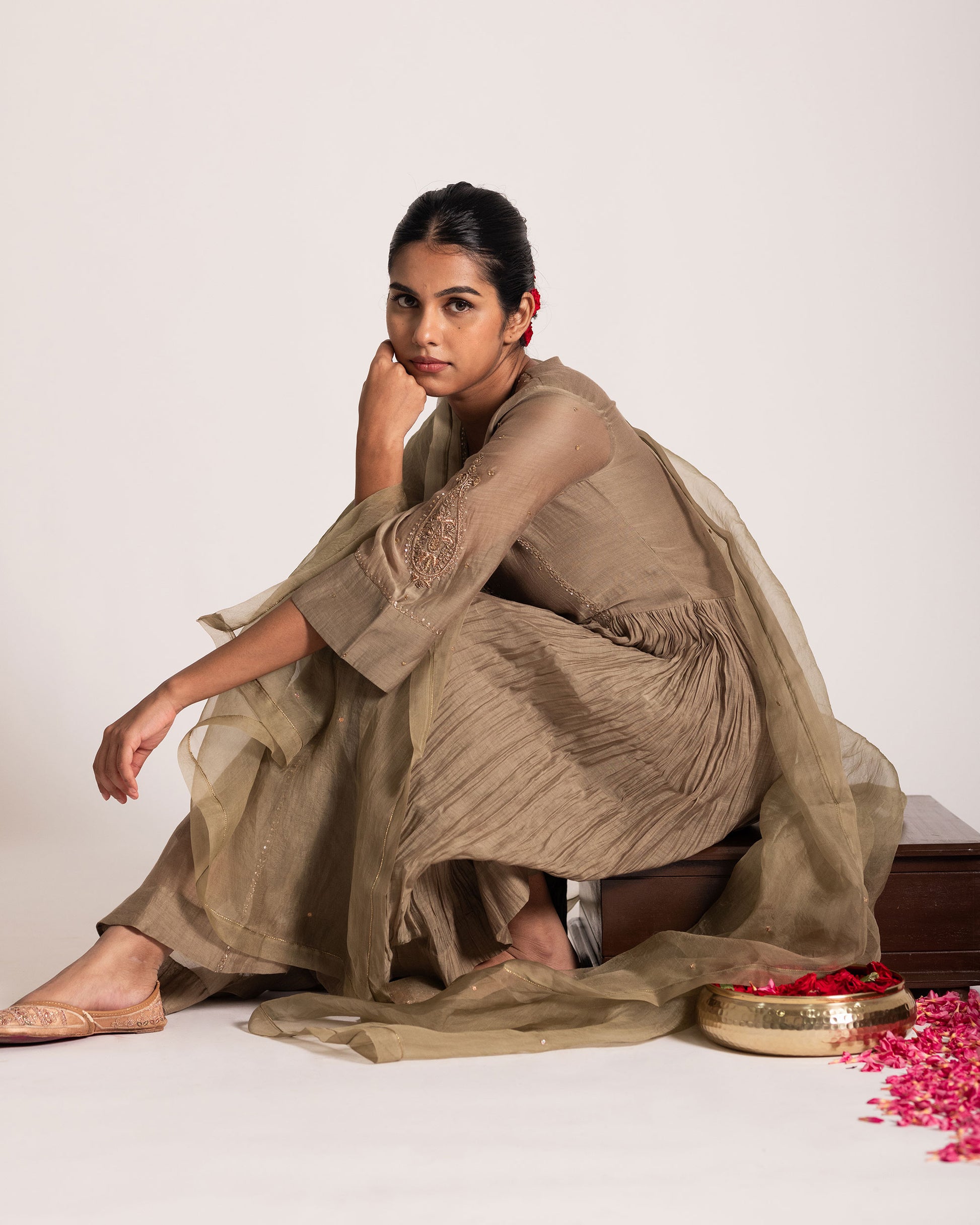 Antique bronze salwar set with rich earthy elegance and timeless detailing, designed for a sophisticated and graceful ethnic ensemble.
