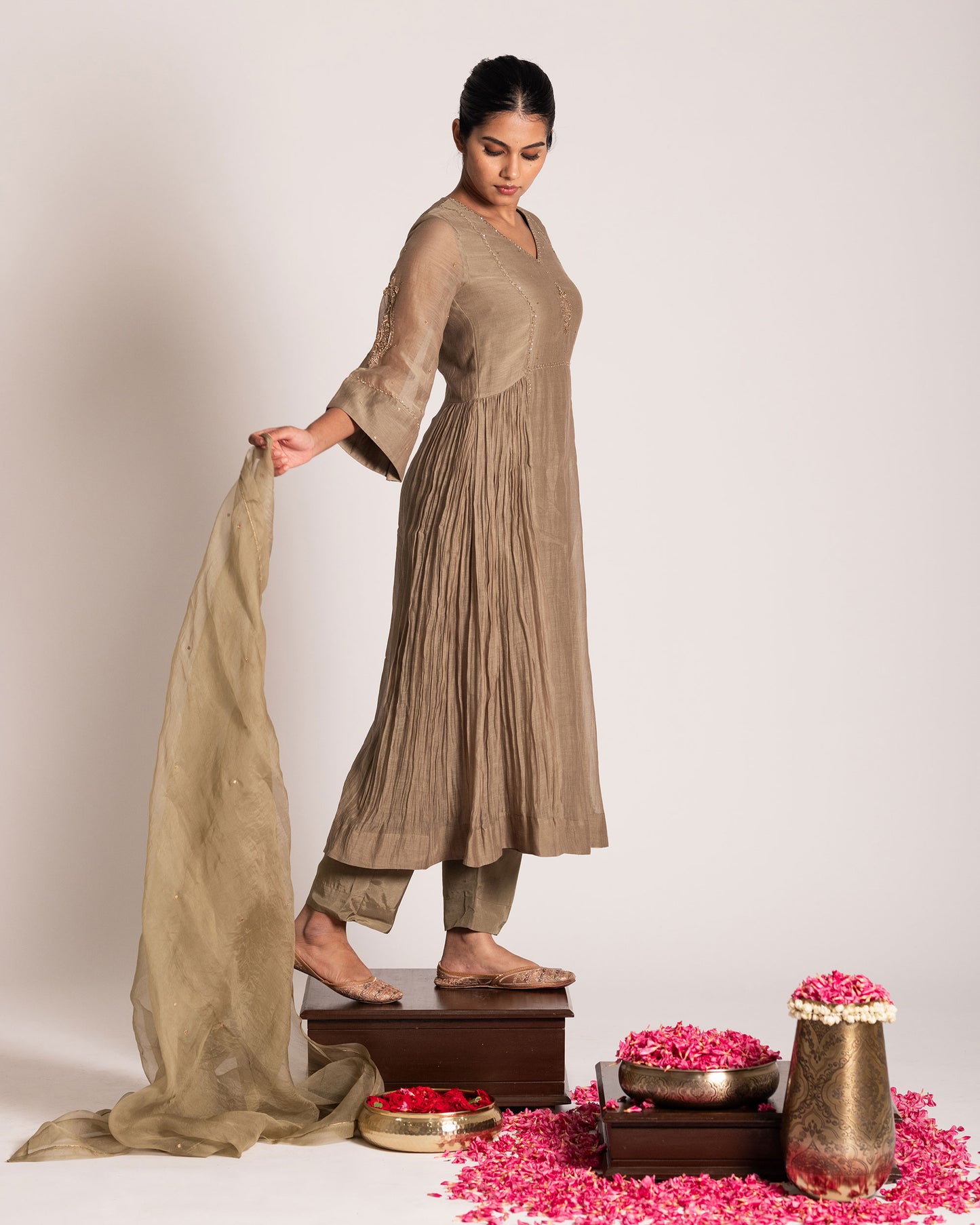 Antique bronze salwar set with rich earthy elegance and timeless detailing, designed for a sophisticated and graceful ethnic ensemble.