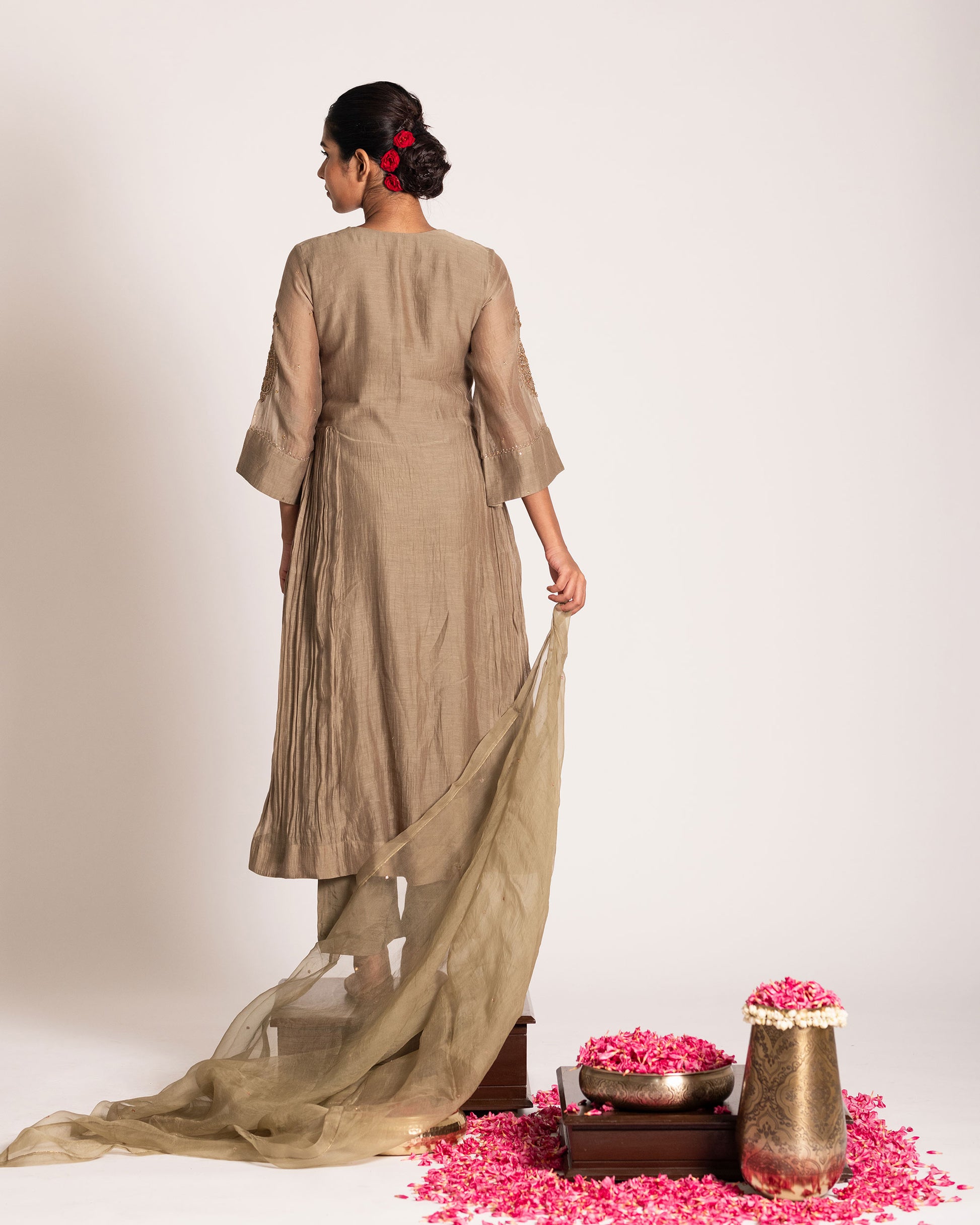 Antique bronze salwar set with rich earthy elegance and timeless detailing, designed for a sophisticated and graceful ethnic ensemble.