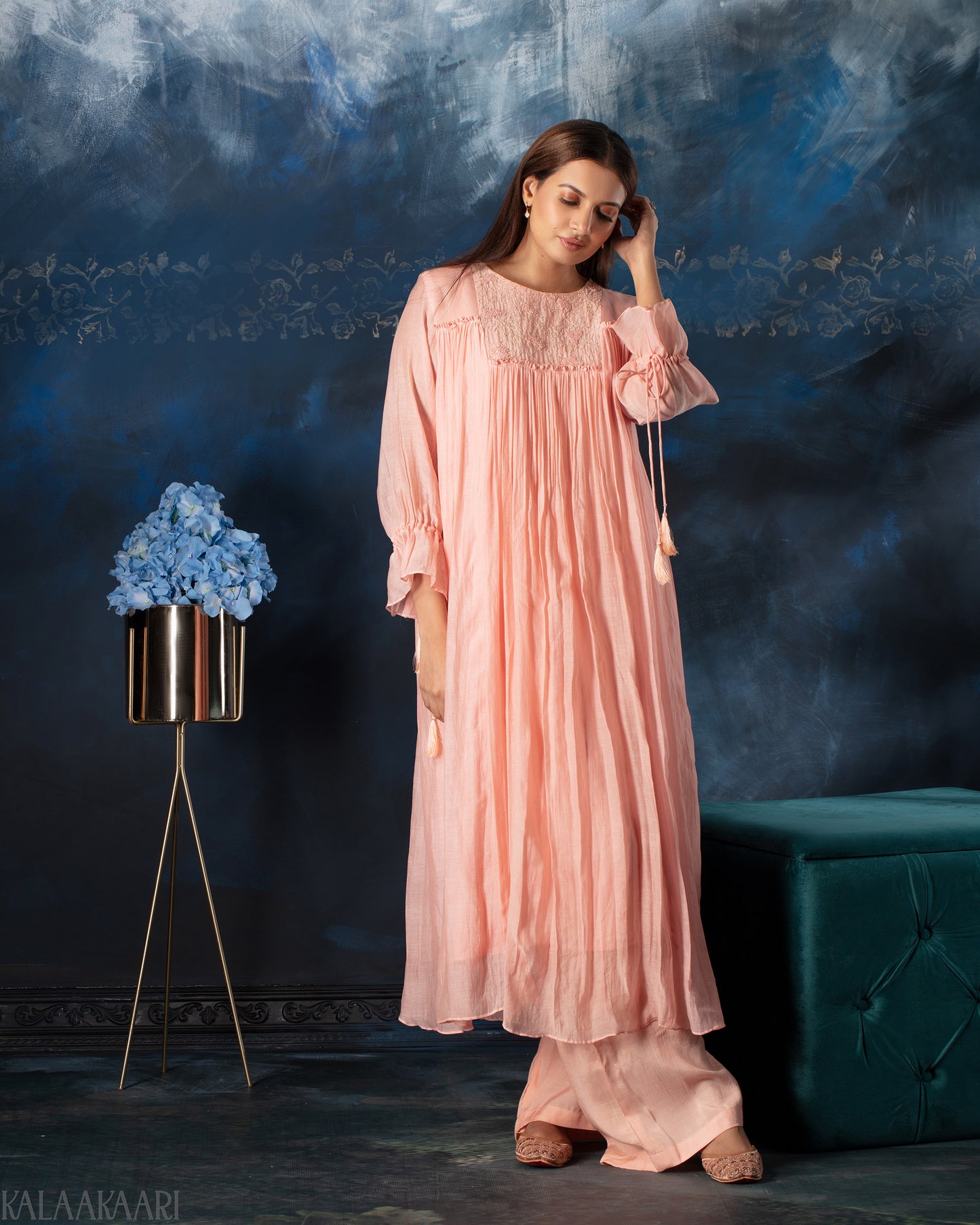 Rose quartz gathered salwar set with soft draping and graceful silhouette, designed for an elegant and effortlessly charming ethnic style.