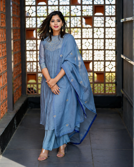 Cool grey hand embroidered salwar set featuring elegant detailing, crafted for a refined ethnic look with timeless sophistication
