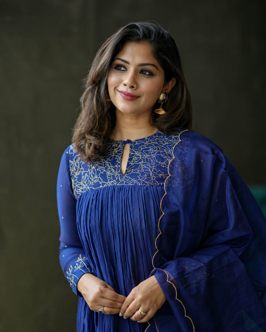 Dark navy blue embroidered salwar set with elegant detailing, premium ethnic wear for festive and occasion styling.